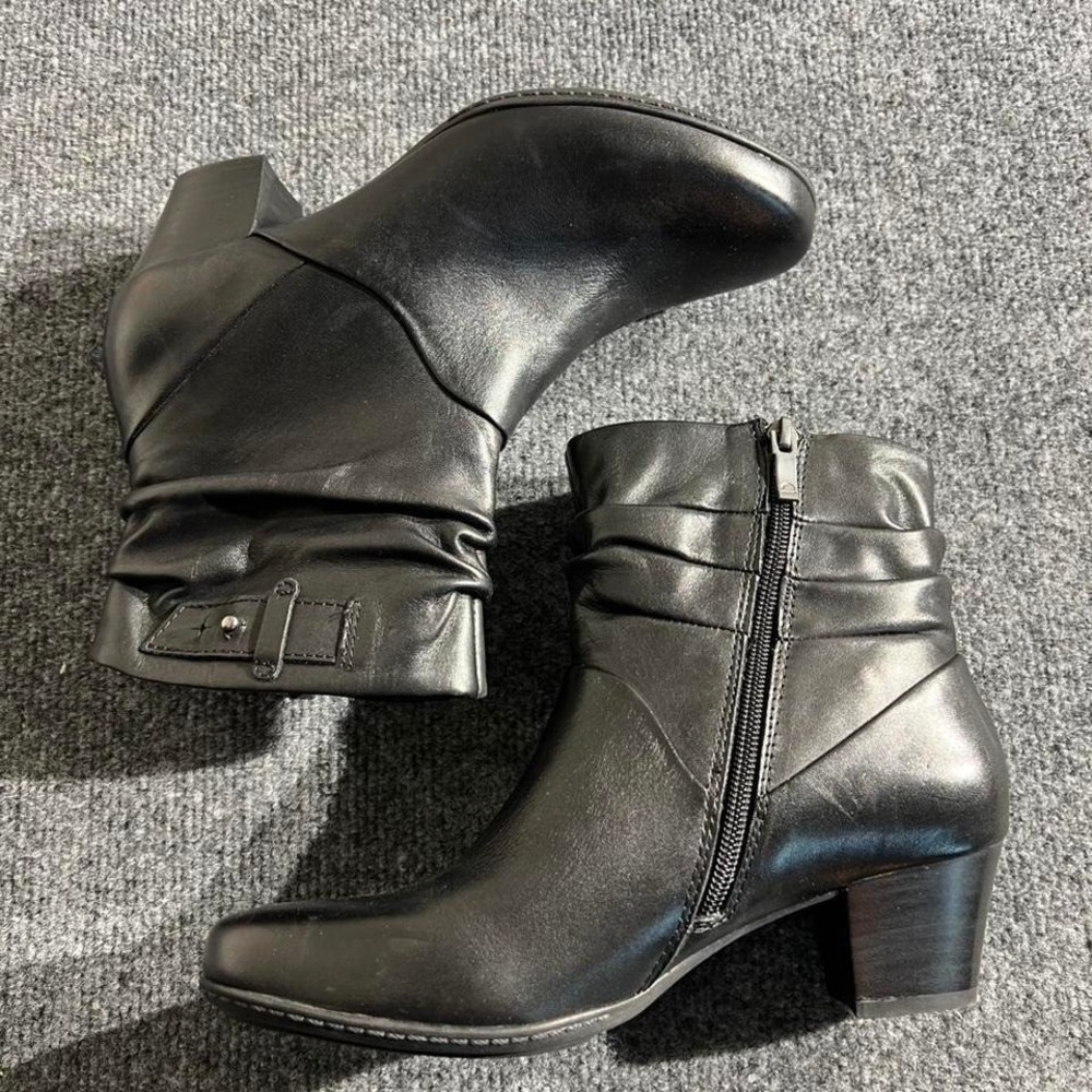 Earth's Black leather ankle boots